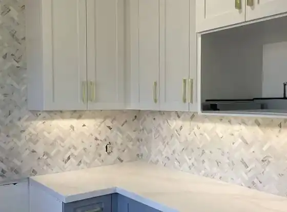 Herringbone tile backsplash