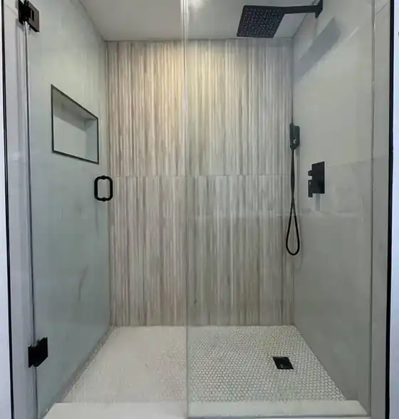 Glass shower enclosure